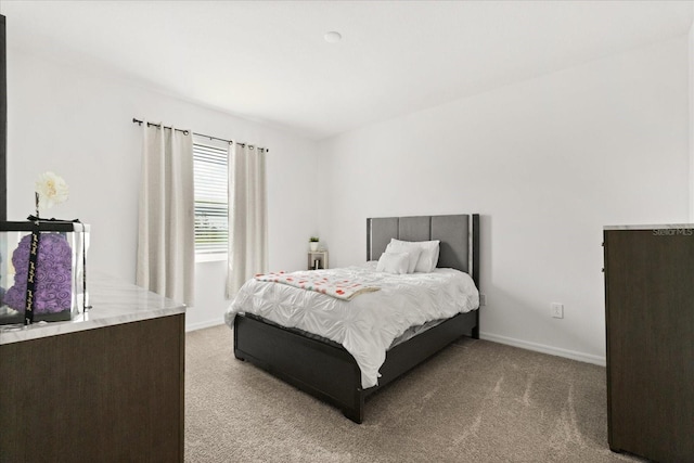 2156 Merrybells Dr, Kissimmee, FL 34746 - bedroom with light carpet and baseboards