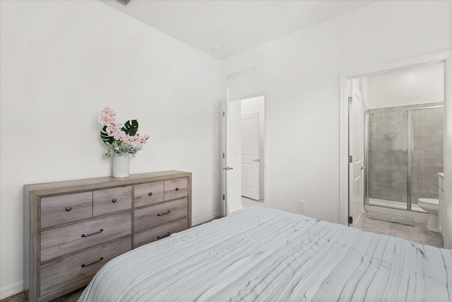 2156 Merrybells Dr, Kissimmee, FL 34746 - bedroom featuring baseboards and connected bathroom