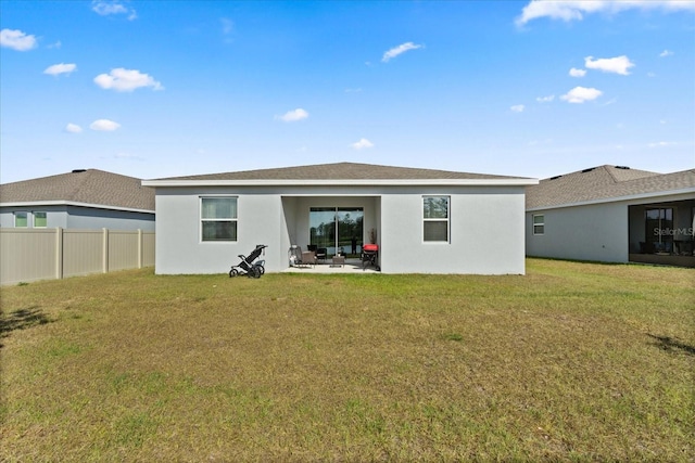 2156 Merrybells Dr, Kissimmee, FL 34746 - rear view of property featuring a patio area and stucco siding