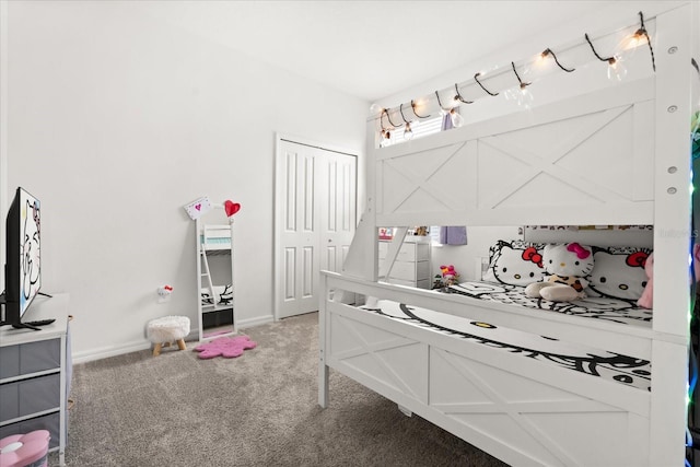 2156 Merrybells Dr, Kissimmee, FL 34746 - carpeted bedroom featuring a closet and baseboards