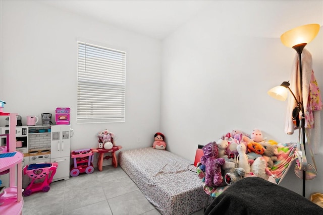 2156 Merrybells Dr, Kissimmee, FL 34746 - bedroom with light tile patterned floors