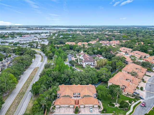 birds eye view of property featuring a residential view and a water view