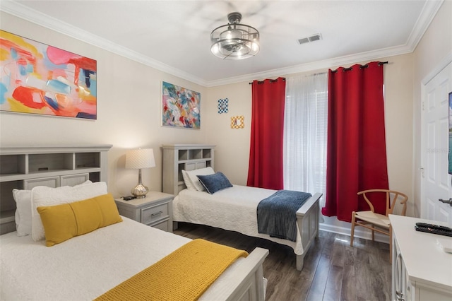 bedroom featuring crown molding, dark wood-style flooring, visible vents, and multiple windows