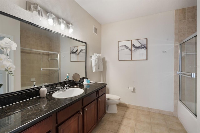 full bathroom with visible vents, tile patterned flooring, vanity, toilet, and baseboards