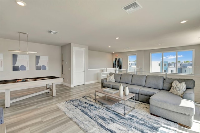 7740 Sandy Ridge Dr Unit 236, Reunion, FL 34747 - living area featuring visible vents, wood finished floors, baseboards, and recessed lighting