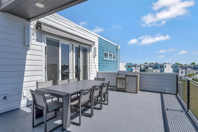 7740 Sandy Ridge Dr Unit 236, Reunion, FL 34747 - view of patio / terrace featuring outdoor dining space, a residential view, and grilling area