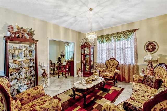 tiled living area with an inviting chandelier