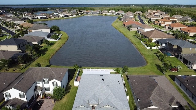 aerial view featuring a water view and a residential view
