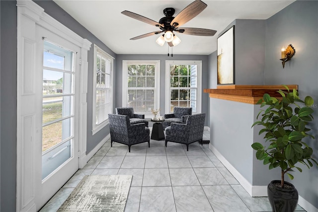 1400 Florida Ave, Saint Cloud, FL 34769 - living area featuring a ceiling fan, baseboards, and light tile patterned floors