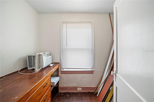 1400 Florida Ave, Saint Cloud, FL 34769 - bedroom featuring dark wood finished floors and an office area
