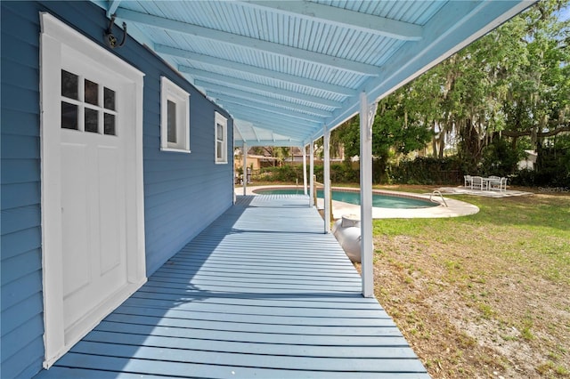 1400 Florida Ave, Saint Cloud, FL 34769 - wooden deck featuring a patio area, an outdoor pool, and a yard