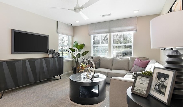 living room featuring carpet floors, a ceiling fan, visible vents, and recessed lighting