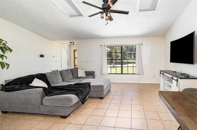 1100 Anne Elisa Cir, Saint Cloud, FL 34772 - living room with a ceiling fan, a textured ceiling, and light tile patterned flooring