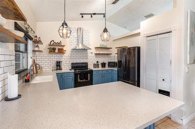 1100 Anne Elisa Cir, Saint Cloud, FL 34772 - kitchen featuring open shelves, black appliances, blue cabinetry, and wall chimney exhaust hood