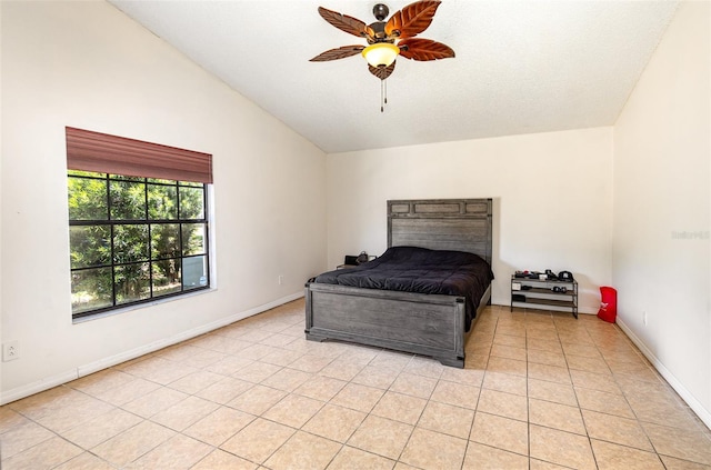 1100 Anne Elisa Cir, Saint Cloud, FL 34772 - bedroom with baseboards, vaulted ceiling, and light tile patterned floors