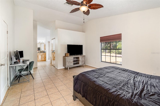 1100 Anne Elisa Cir, Saint Cloud, FL 34772 - bedroom featuring visible vents, baseboards, ceiling fan, light tile patterned floors, and vaulted ceiling
