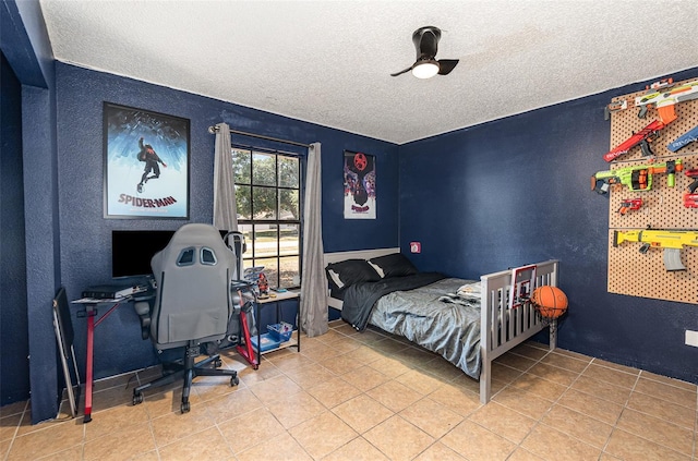 1100 Anne Elisa Cir, Saint Cloud, FL 34772 - tiled bedroom featuring a textured ceiling