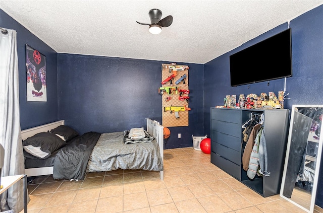 1100 Anne Elisa Cir, Saint Cloud, FL 34772 - bedroom featuring light tile patterned floors and a textured ceiling