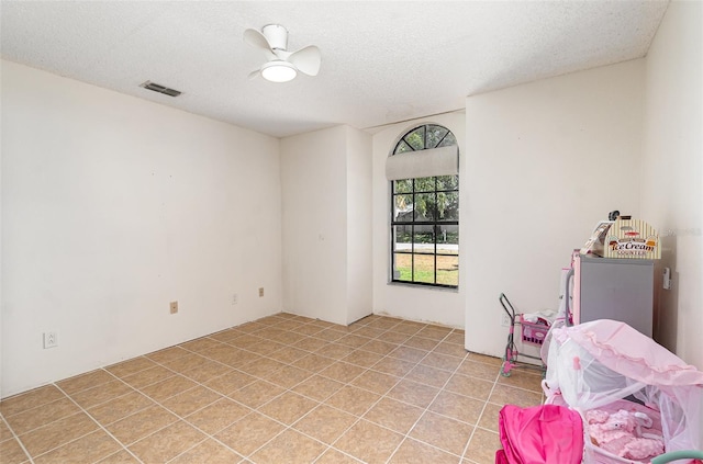1100 Anne Elisa Cir, Saint Cloud, FL 34772 - unfurnished room with visible vents and a textured ceiling