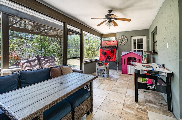 1100 Anne Elisa Cir, Saint Cloud, FL 34772 - sunroom / solarium featuring a ceiling fan and outdoor dining space