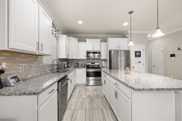 kitchen featuring ornamental molding, marble finish floor, a center island, a sink, and stainless steel appliances