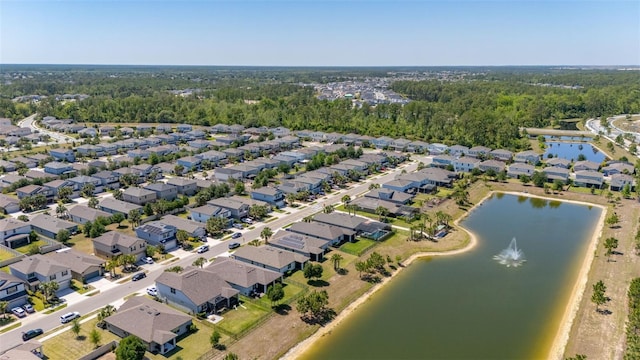 aerial view with a water view and a residential view