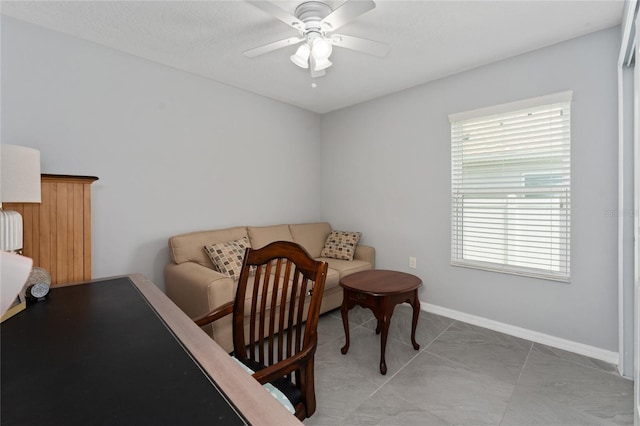 1532 Angler Ave, Kissimmee, FL 34746 - sitting room featuring baseboards, radiator, and ceiling fan