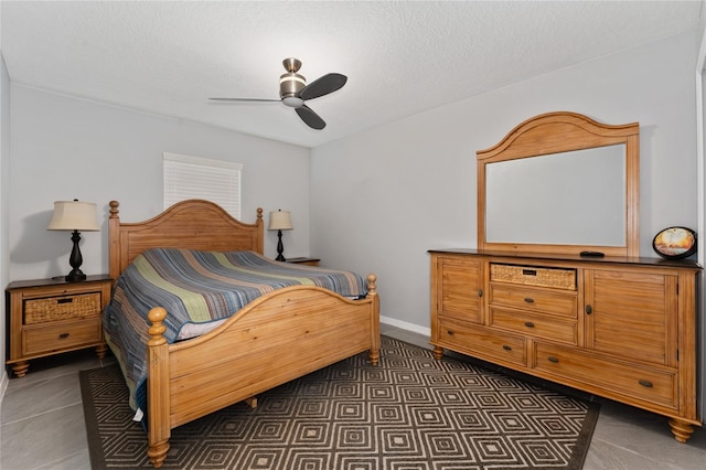 1532 Angler Ave, Kissimmee, FL 34746 - bedroom with a textured ceiling and a ceiling fan