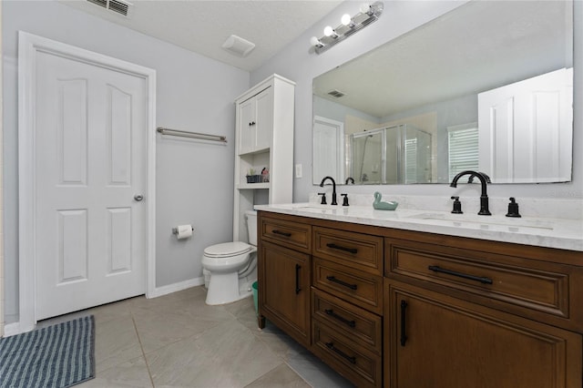1532 Angler Ave, Kissimmee, FL 34746 - bathroom featuring a sink, double vanity, toilet, and a stall shower