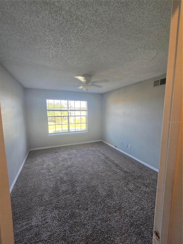 4301 Lizshire Ln Unit 306, Orlando, FL 32822 - carpeted empty room with a ceiling fan, a textured ceiling, and baseboards
