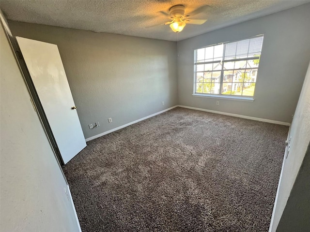 4301 Lizshire Ln Unit 306, Orlando, FL 32822 - unfurnished room with a textured ceiling, carpet floors, a ceiling fan, and baseboards