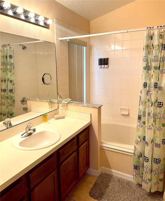 314 Saddle Ridge Dr, Davenport, FL 33896 - full bath featuring tile patterned flooring, a textured ceiling, shower / tub combo, and vanity
