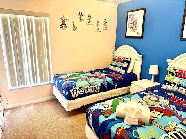 314 Saddle Ridge Dr, Davenport, FL 33896 - carpeted bedroom featuring baseboards