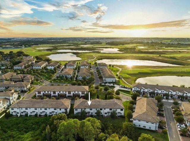 1231 Sandwedge St, Davenport, FL 33896 - drone / aerial view with a water view, view of golf course, and a residential view