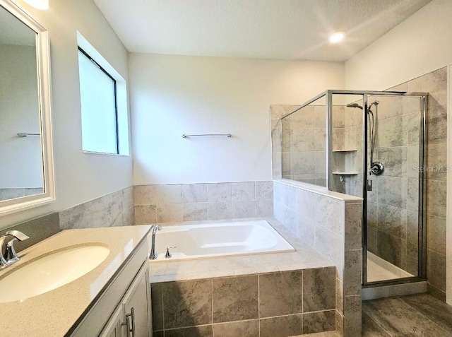 1231 Sandwedge St, Davenport, FL 33896 - bathroom with a garden tub, a stall shower, and vanity