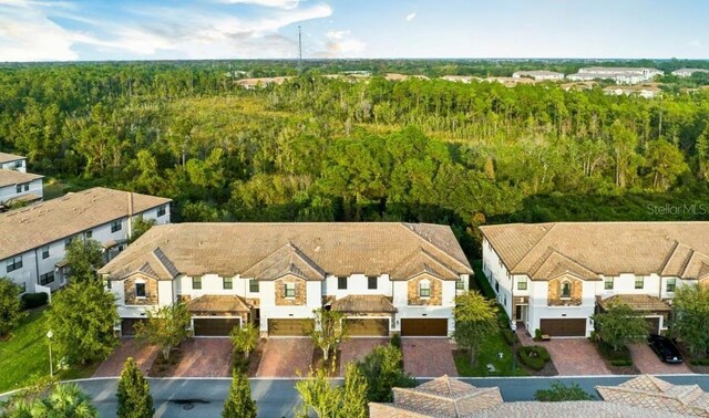 1231 Sandwedge St, Davenport, FL 33896 - aerial view featuring a view of trees