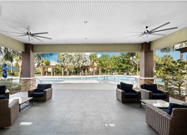 1231 Sandwedge St, Davenport, FL 33896 - view of patio / terrace featuring a community pool and a ceiling fan