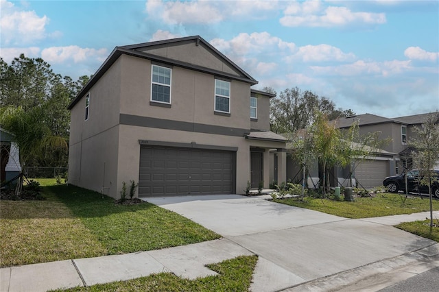 2189 Teneroc Trl, Lakeland, FL 33801 - traditional-style house with a garage, stucco siding, driveway, and a front yard