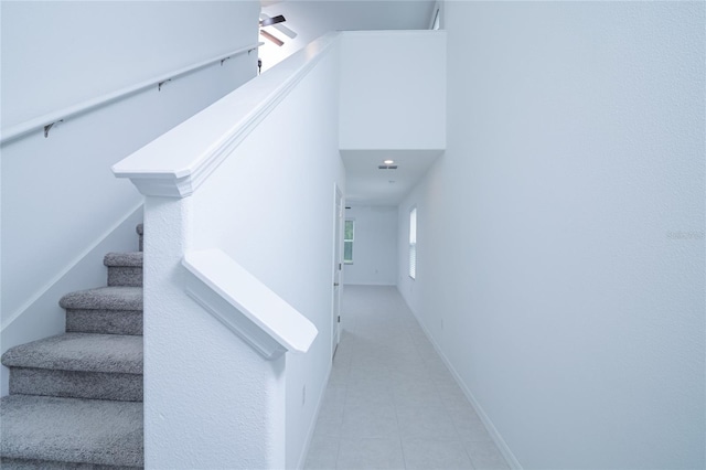 2189 Teneroc Trl, Lakeland, FL 33801 - stairs with tile patterned floors and baseboards
