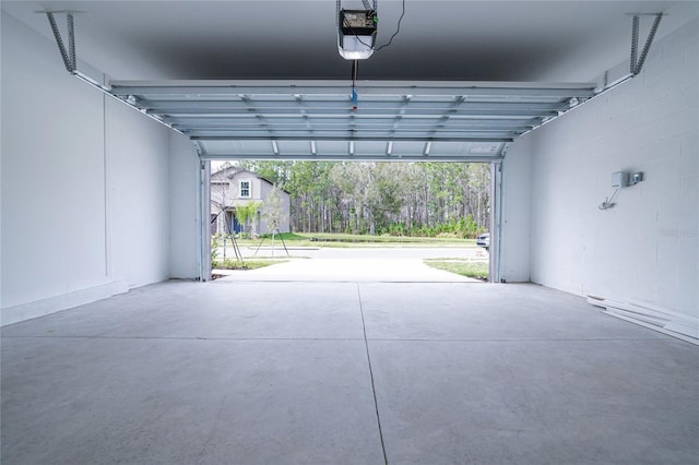2189 Teneroc Trl, Lakeland, FL 33801 - garage with a garage door opener