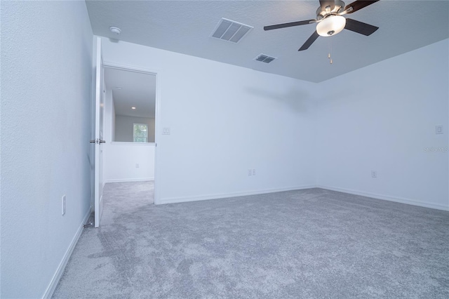 2189 Teneroc Trl, Lakeland, FL 33801 - carpeted spare room with visible vents, baseboards, and ceiling fan