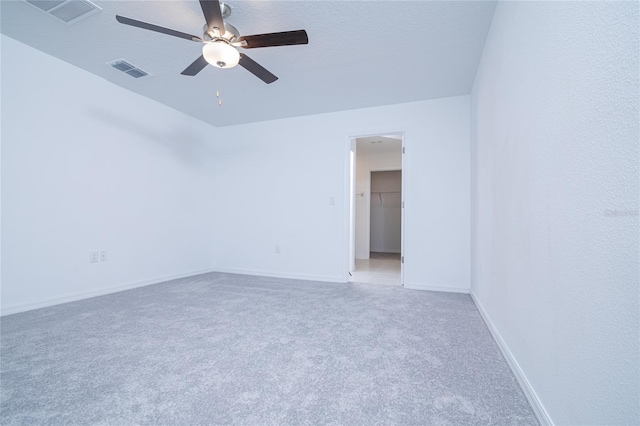 2189 Teneroc Trl, Lakeland, FL 33801 - unfurnished room with baseboards, ceiling fan, light carpet, and visible vents