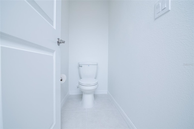 2189 Teneroc Trl, Lakeland, FL 33801 - bathroom with toilet, tile patterned floors, and baseboards