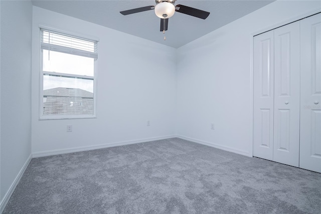 2189 Teneroc Trl, Lakeland, FL 33801 - unfurnished bedroom featuring carpet floors, baseboards, ceiling fan, and a closet