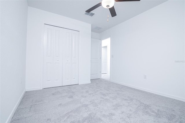 2189 Teneroc Trl, Lakeland, FL 33801 - unfurnished bedroom featuring baseboards, visible vents, carpet, and a closet