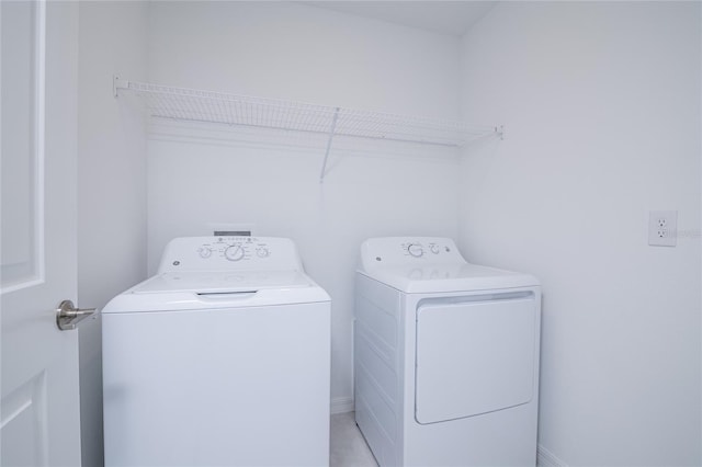 2189 Teneroc Trl, Lakeland, FL 33801 - laundry room featuring laundry area and washer and clothes dryer