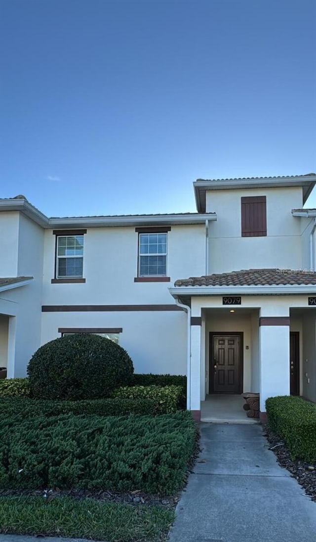 9079 Dogleg Dr, Davenport, FL 33896 - view of front of property featuring stucco siding