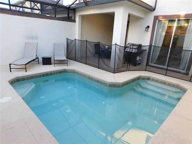 9079 Dogleg Dr, Davenport, FL 33896 - view of swimming pool with a patio, a fenced in pool, and a lanai
