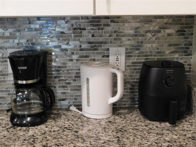 9079 Dogleg Dr, Davenport, FL 33896 - kitchen view of light stone counters
