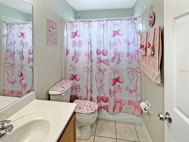 8439 Adele Rd, Lakeland, FL 33810 - full bath with toilet, vanity, shower / bath combo, tile patterned floors, and a textured wall